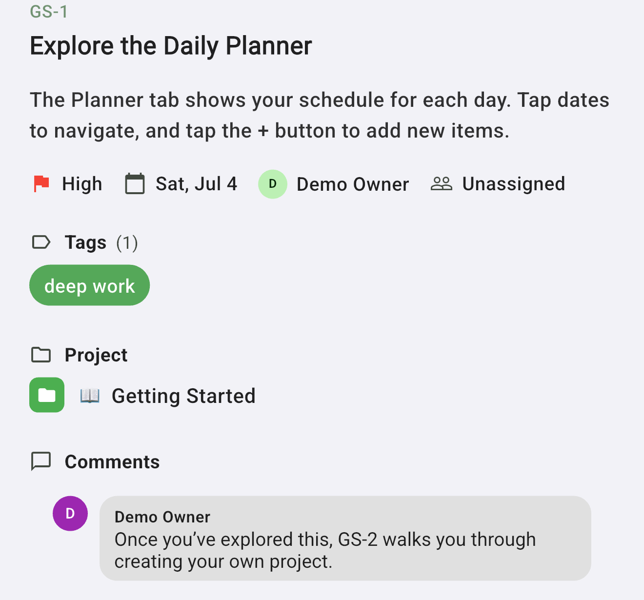 A task detail view showing the task key GS-1, title, description, High priority, a due date, a tag, the parent project, and a comment attributed to its author that references another task by its key.